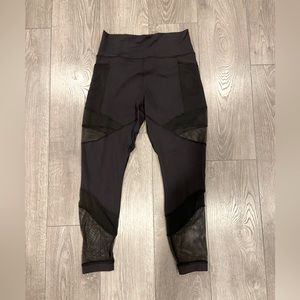 Lululemon black leggings with fishnet mesh panels